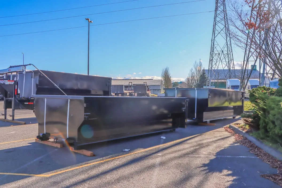Roll-off dumpster ready for waste disposal at job site for Concrete Dumpster Rental in Gaffney